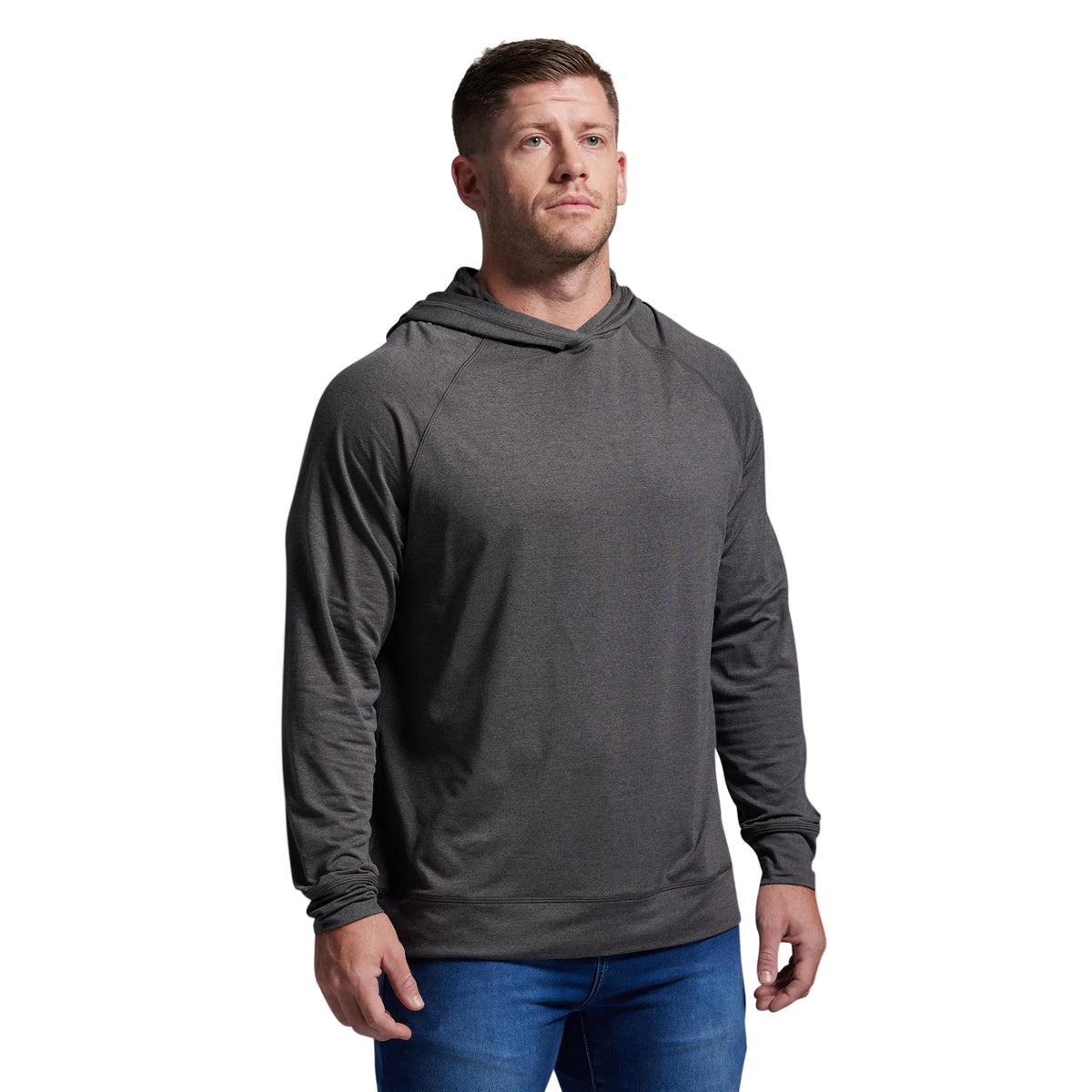 Man wearing a gray hoodie against a plain background