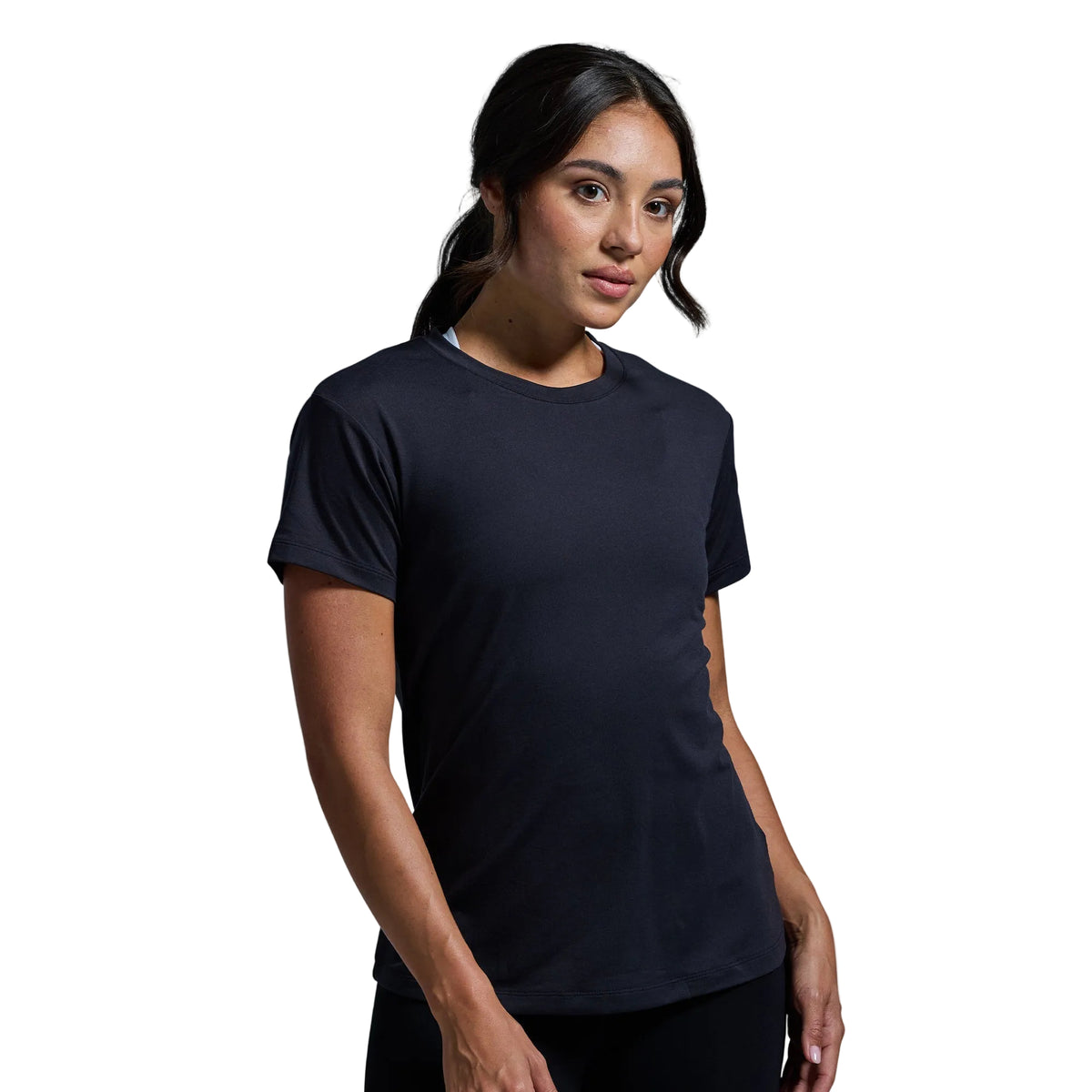Woman wearing a black t-shirt against a plain background