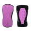 Pair of pink and black knee pads with visible branding on a black background