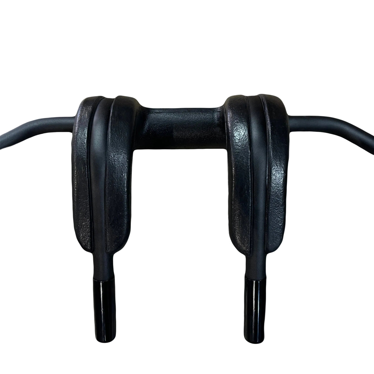 Close-up of black handlebar risers on a gray background