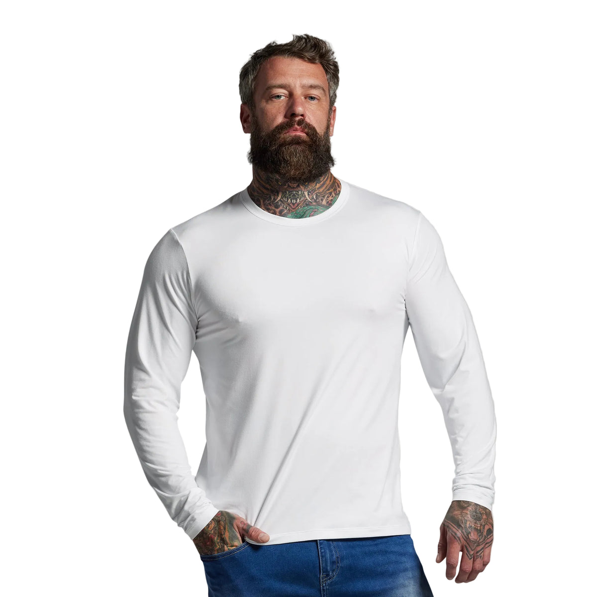 Man wearing a white long-sleeve shirt against a gray background