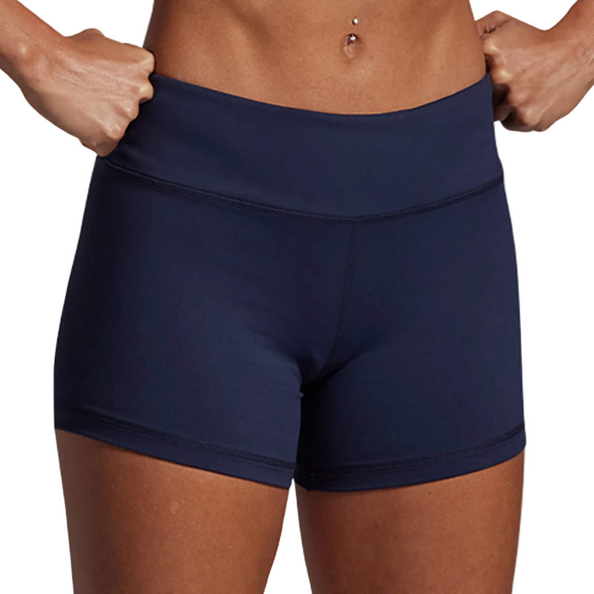 Navy blue athletic shorts worn by a person on a gray background