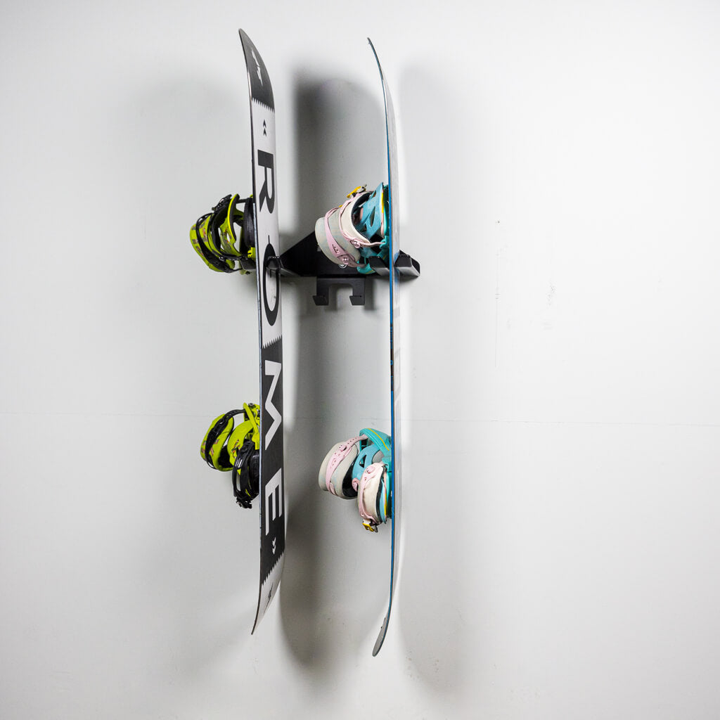 wall mounted ski and snowboard storage with 2 snowboards