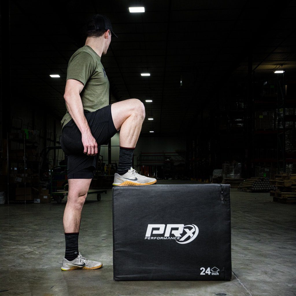 Athlete stepping up on the soft plyo box