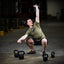 Iron Kettlebells surrounding athlete