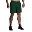 Person wearing green shorts on a gray background