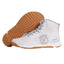 White high-top sneaker with brown sole on a gray background
