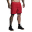 Person wearing red shorts on a gray background