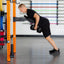 man using PRx Axis Pad with dumbbells