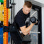 man using PRx Axis Pad for dumbbell curls