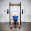 Build Limitless® Economy Wall Mounted Rack with man lifting barbell