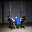 Build Limitless® Economy Squat Stand with man doing squats