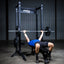 Build Limitless® Economy Half Rack with man doing a bench press