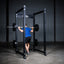 Build Limitless® Economy Full Cage with man and loaded barbell