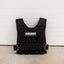 Weight vest standing upright on floor.