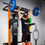 Athlete using Spotter Arms for overhead press