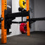 3x3 PRO spotter arm accessory set in a low position on the rack