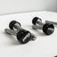 Pair of PRx Mag Pins on a white surface with a gray background