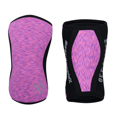 Pair of pink and black knee pads with visible branding on a black background