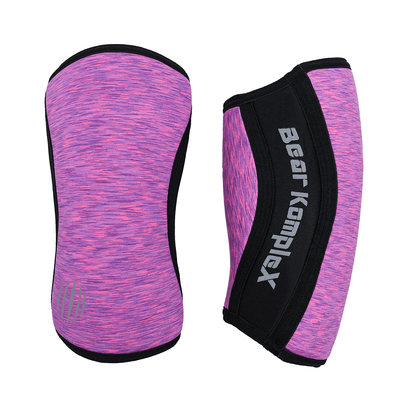 Purple knee sleeves with black accents and 'Bear KompleX' branding on a white background