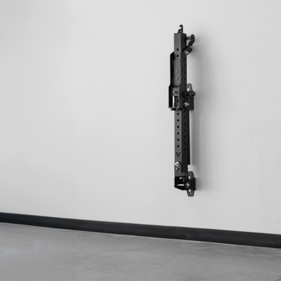 GIF of wall mounted belt squat machine