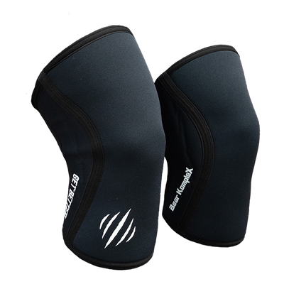 Black knee sleeves with brand logo on a white background