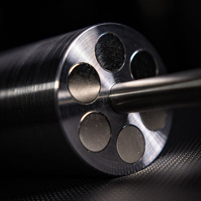 Close-up of a revolver barrel on a dark background