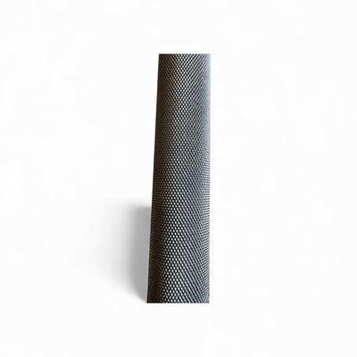 Textured black cylindrical object on a white background