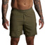 Person wearing olive green shorts on a plain background