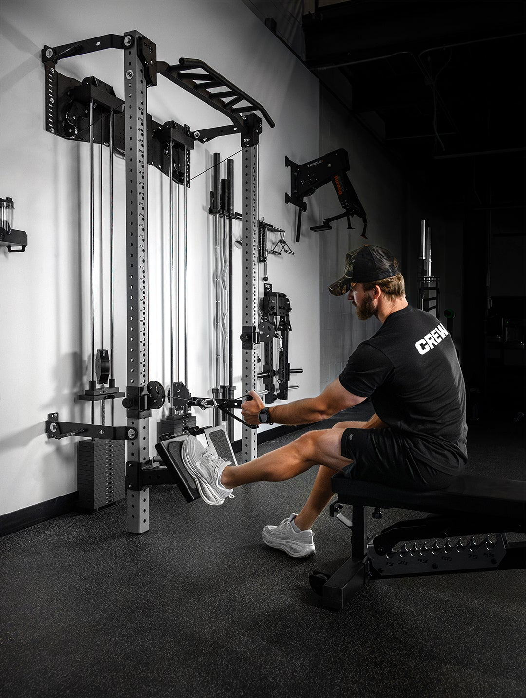 Person using a cable machine in a gym setting