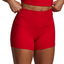 Red athletic shorts worn by a person on a gray background