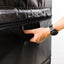 Person's hand gripping plyo box handle to demonstrate ease of use.