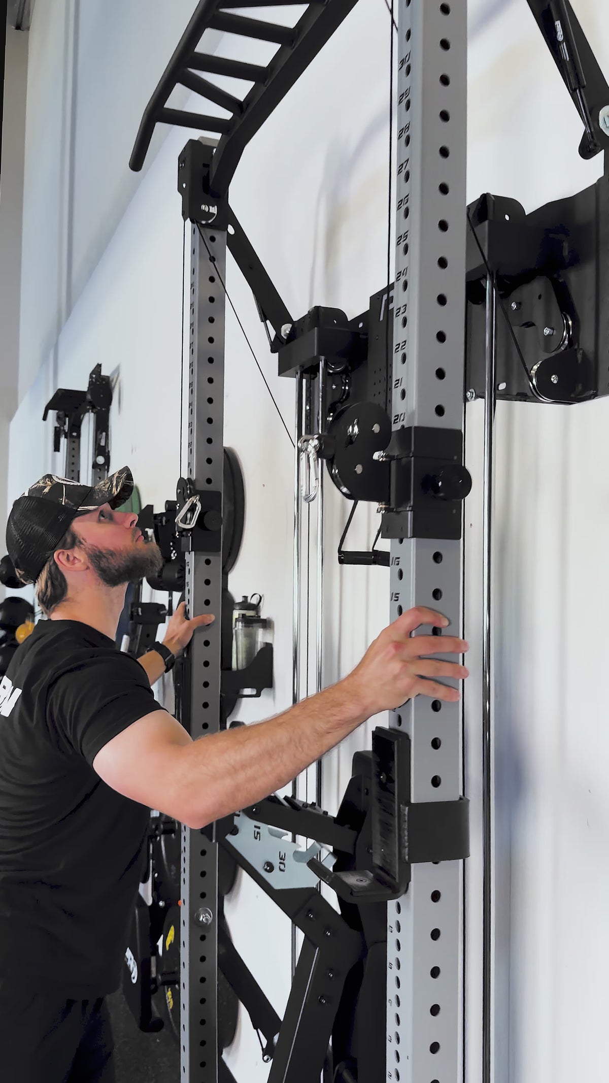 Load video: man and woman working out in various home gym settings