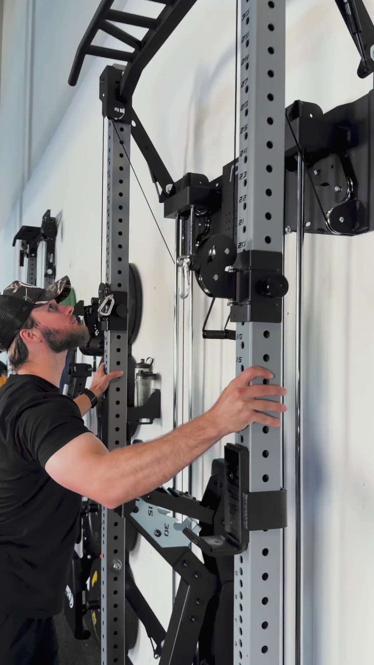 Load video: man and woman working out in various home gym settings