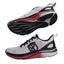 White running shoes with black and red accents on a gray background