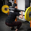 Athlete in squat position with safety bar