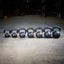 line up of powder coated kettlebells