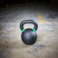 Powder coated kettlebell on ground