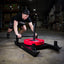 Athlete pushing prowler sled by PRx