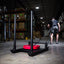 PRx athlete pulling loaded sled with harness